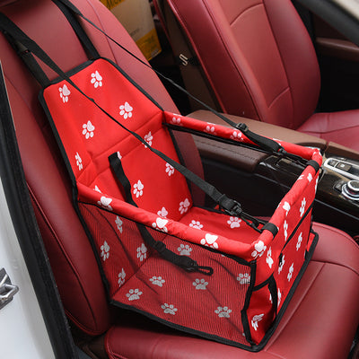 Light grey pet car booster seat with black mesh sides and adjustable straps, installed on a black and red car seat. - Image 19