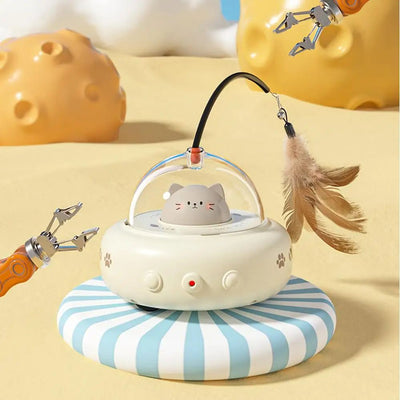Electric interactive cat toy with a beige base, clear dome, and a cute cat head inside. Features a feather teaser wand with a bell. - Image 17