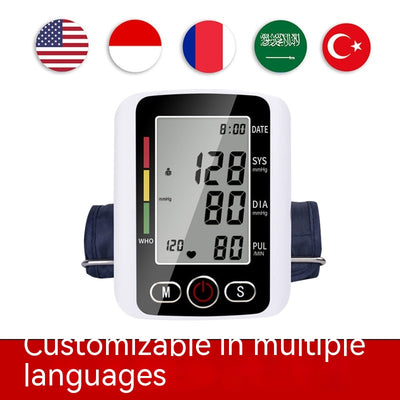 White electronic arm blood pressure monitor with large digital display and dark blue cuff, next to its product box. - Image 3