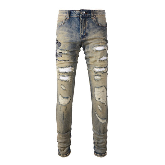 Jeans Slim Fit Desgastados con Bordado de Serpiente de Tres Cabezas y Parches de Cuero - Image 4