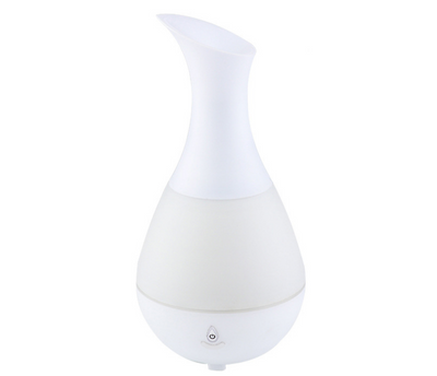 White teardrop-shaped aromatherapy humidifier with a curved neck and a power button, featuring a translucent middle section. - Image 4
