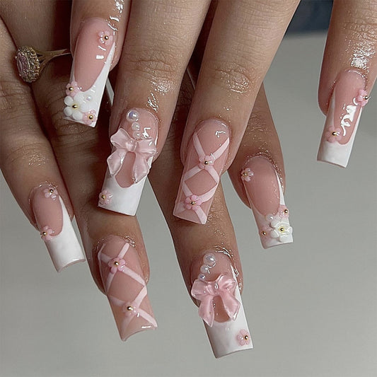 Manicura Elegante con Moños - Diseño Femenino y Sofisticado