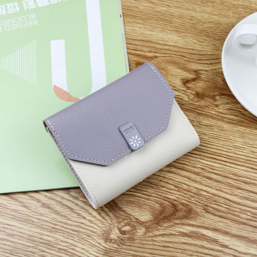 Billetera Compacta para Mujer con Cierre de Contraste y Compartimentos Múltiples - Image 7
