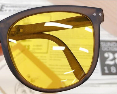 Light brown foldable women's sunglasses with round frames and brown polarized lenses on a white background. - Image 19