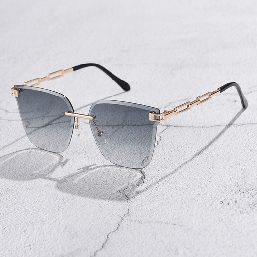 Frameless oversized square sunglasses with brown gradient lenses and gold-tone metal temples, featuring decorative black studs. - Image 22