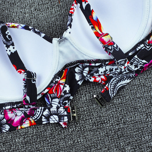 Olive green floral print bikini top with tie-front and solid high-waisted ruched bottoms on a grey background. - Image 16