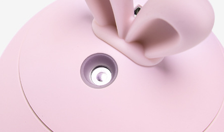 Cute pink rabbit desktop mini USB humidifier with a silver band, featuring a compact egg shape and bunny ears. - Image 5