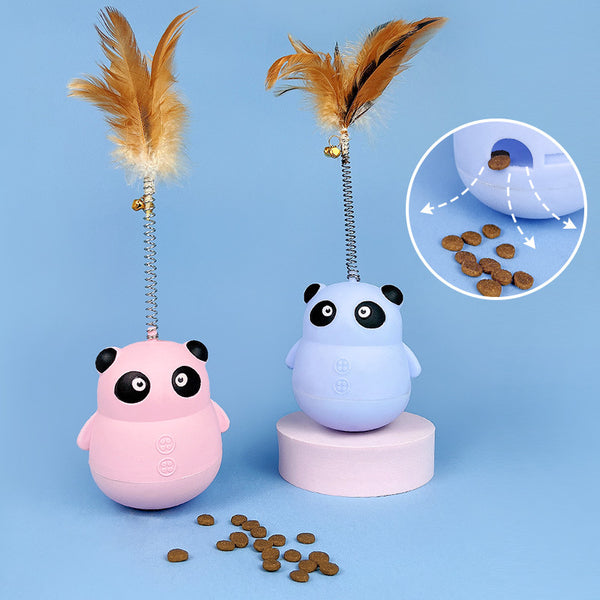 Light blue panda tumbler pet toy with a spring-attached feather and bell, designed to dispense treats.