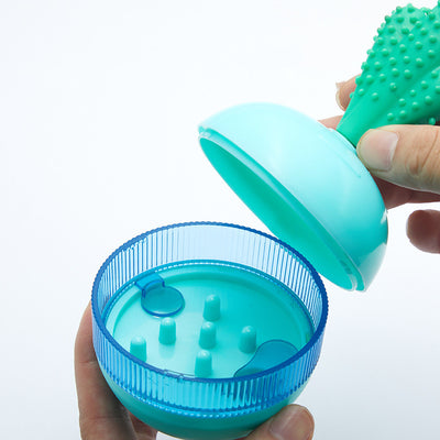 Light blue pet food dispensing ball toy with a translucent blue band and a green cactus-shaped top. - Image 7