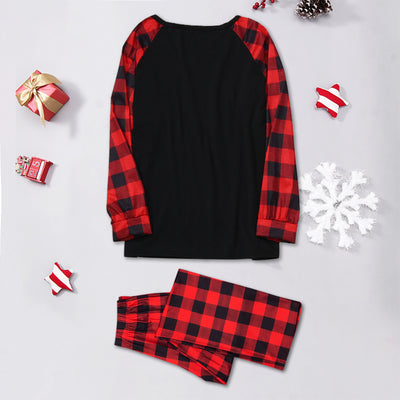 Family matching Christmas pajamas with black tops, red plaid sleeves, and Santa wearing a mask, paired with red plaid pants. - Image 28