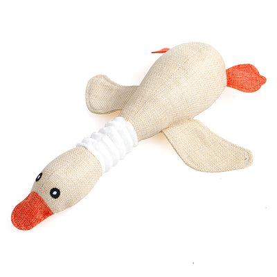 Plush teal duck dog toy with orange beak and feet, and a white ribbed neck, designed for sounding and puzzling. - Image 27