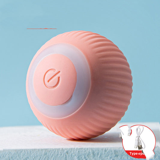 Pink USB rechargeable electric rolling ball cat toy with a textured surface and a power button, shown with its charging cable. - Image 3