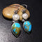 Aretes étnicos vintage con piedra azul en forma de gota