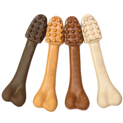 YaHo bone-shaped dog snacks in various brown and tan shades, some with dental nubs, in a black bowl. - Image 4