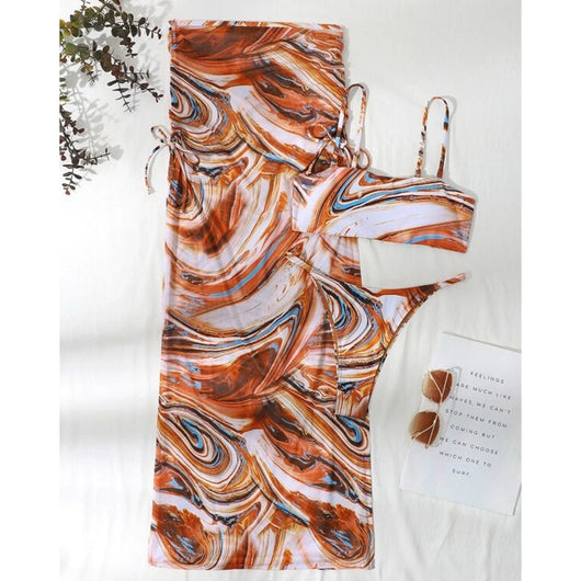 Women's 3-piece bikini set with a brown, white, and blue tie-dye wave pattern, including a top, bottom, and sarong. - Image 3