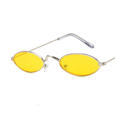 Retro oval frame sunglasses with vibrant red lenses and shiny gold-colored metal frames on a white background. - Image 20