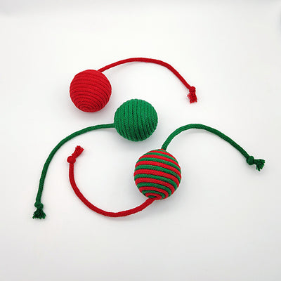 Red and green striped cotton rope ball cat toy with two rope tails, ideal for Christmas interactive play. - Image 2