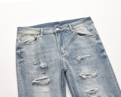 Jeans Azules Rotos con Desgaste Vintage - Image 3