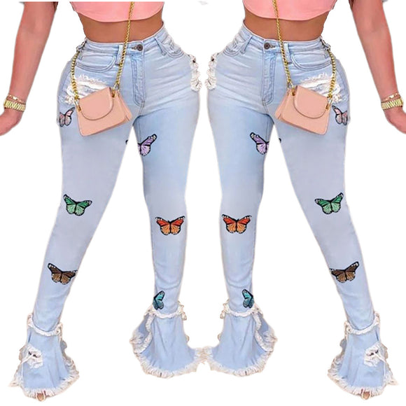 Blue Jeans with Embroidered Butterflies and Distressed Details