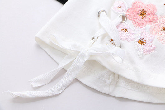 Camiseta Suelta de Algodón con Bordado Floral y Cordones para Mujer - Image 13