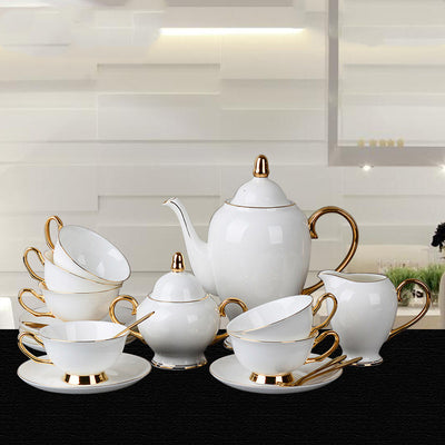 Juego de Taza y Platillo de Porcelana Fina con Detalles Dorados para Té de la Tarde