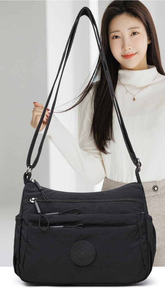Bolsa Mensajera Casual Ligera Multicompartimento Diseño Simple - Image 18