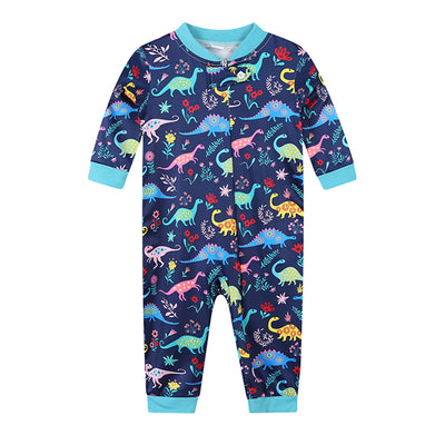 Matching family Christmas pajamas in green with a festive pattern of Santa, reindeer, and Christmas trees. - Image 5