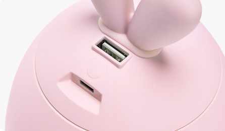 Cute pink rabbit desktop mini USB humidifier with a silver band, featuring a compact egg shape and bunny ears. - Image 10