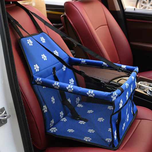 Light grey pet car booster seat with black mesh sides and adjustable straps, installed on a black and red car seat. - Image 9