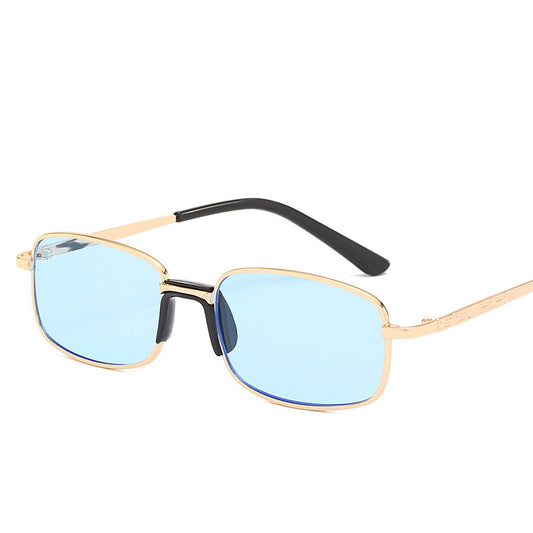 Vintage gold-colored metal frame sunglasses with light blue rectangular lenses and black temple tips. - Image 2