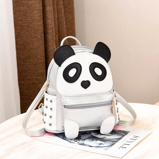 Metallic gold and white cartoon panda backpack with black ears and eye patches, a heart nose, and studded side panels. - Image 13