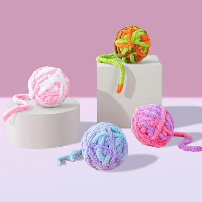 Pink and purple striped plush cat toy ball, made from chunky yarn, designed for silent play and chewing. - Image 16