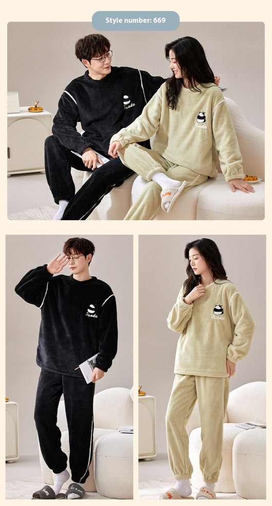 Couple wearing matching cream coral fleece pajamas with gray pants and bear embroidery, seated on a bed. - Image 35