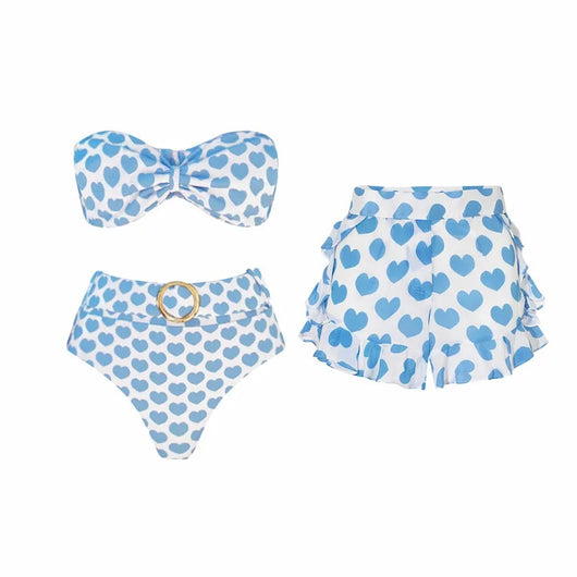 White shorts with blue heart print and ruffled sides, perfect for a fun vacation or casual summer day. - Image 15
