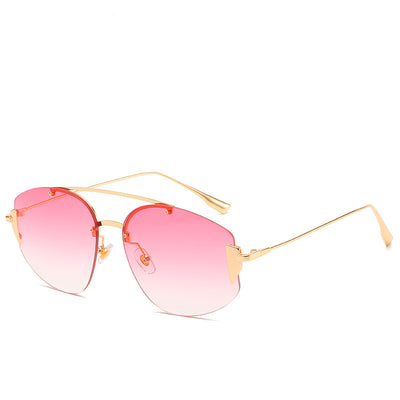 Women's fashion rimless sunglasses with blue to yellow gradient lenses and a gold-colored metal frame. - Image 5