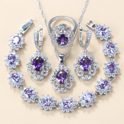 Four-piece jewelry set with silver-tone settings, featuring oval purple cubic zirconia stones surrounded by clear accents. - Image 10
