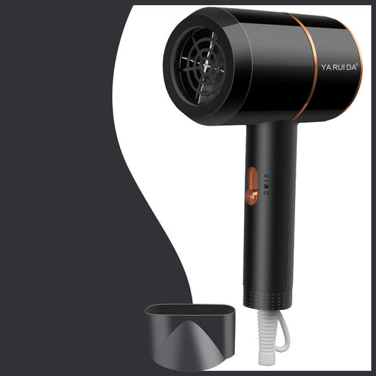 White portable folding hair dryer with rose gold accents and a nozzle attachment, shown with its base. - Image 13
