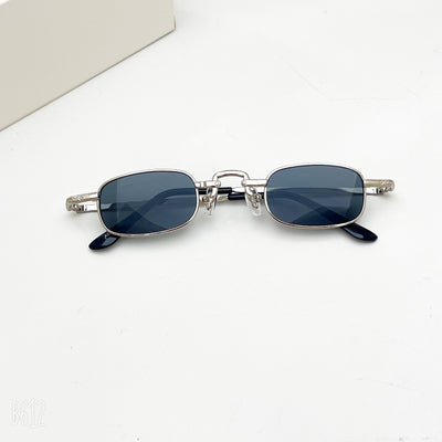 Black retro hip hop sunglasses with dark rectangular lenses and a sleek metal frame on a white background. - Image 4