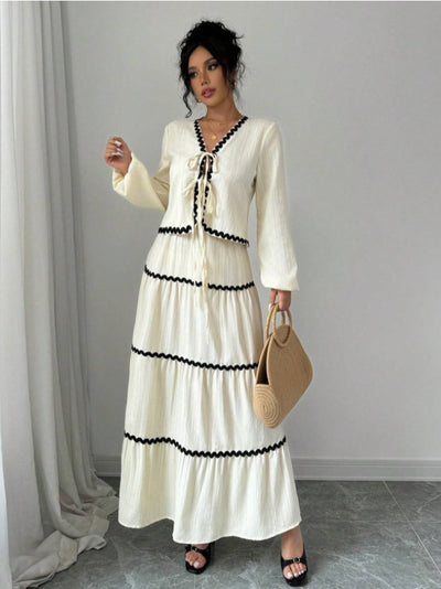 Conjunto Elegante con Blusa de Encaje y Falda Plisada con Mangas Farol - Image 19