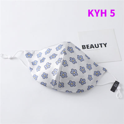 White silk face mask with light blue floral pattern and adjustable ear loops for women's sun protection. - Image 6