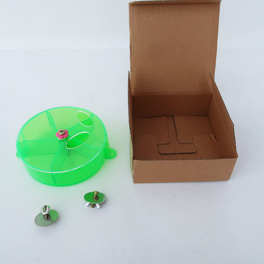 Clear acrylic bird foraging wind wheel toy with multiple compartments filled with nuts and dried fruit, attached to a bird cage. - Image 6