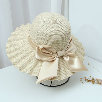 Sombrero Playero de Ala Ancha con Patrón de Conchas y Lazo Festivo