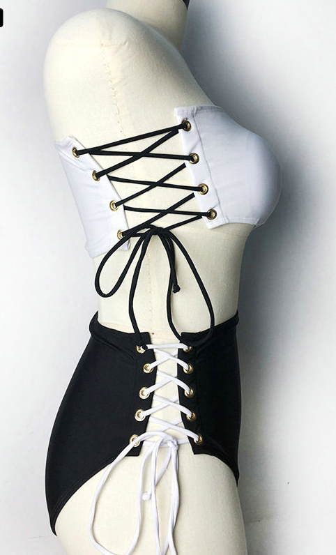 Black and white one-piece bikini with a one-shoulder white top and high-waisted black bottom, featuring lace-up sides. - Image 8