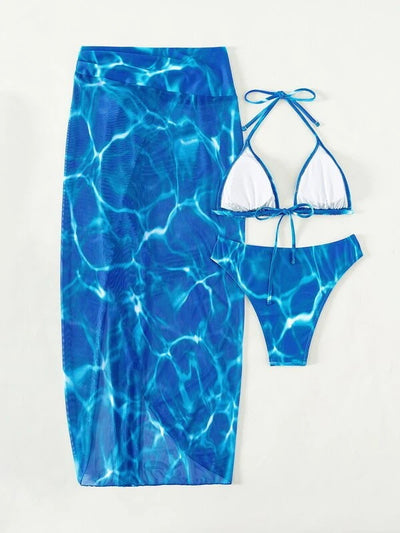 Women's pink and white tie-dye three-piece bikini swimsuit with a halter top, bottoms, and high-slit sarong. - Image 24