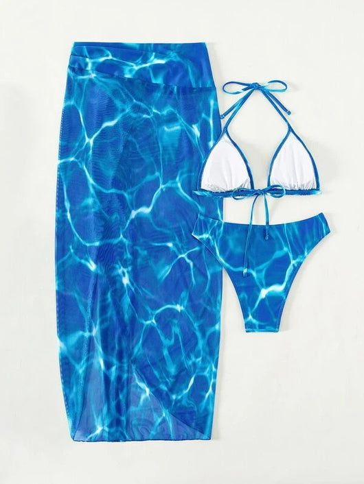 Women's pink and white tie-dye three-piece bikini swimsuit with a halter top, bottoms, and high-slit sarong. - Image 24