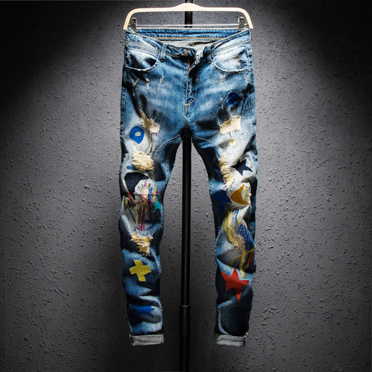 Jeans Azules con Parches Bordados Coloridos