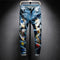 Jeans Azules con Parches Bordados Coloridos
