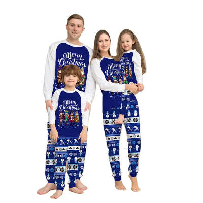 Blue and white long-sleeve Christmas pajama set with "Merry Christmas" text, nutcracker soldiers, and snowflake patterns. - Image 10