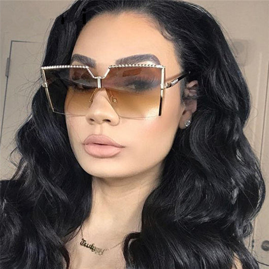 Frameless conjoined sunglasses with gold metal frame and braided detail, featuring brown gradient lenses. - Image 10