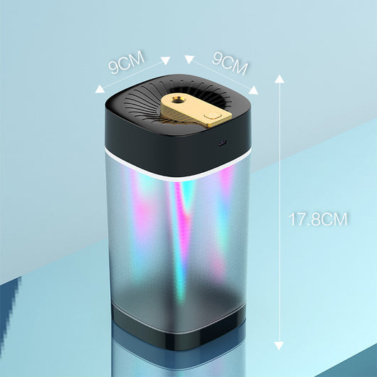 Modern cylindrical USB aroma humidifier with a metallic silver body, white top and base, and a gold mist outlet. - Image 7